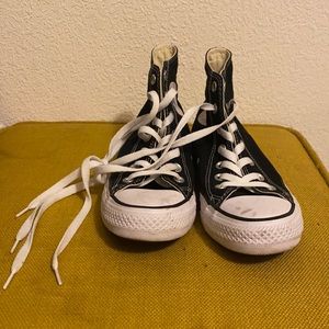 Classic black high-top Chuck Taylor’s